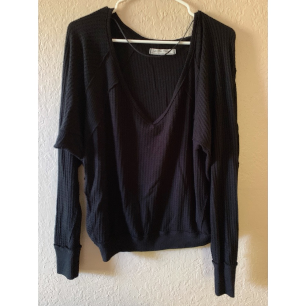 We the free top, good condition